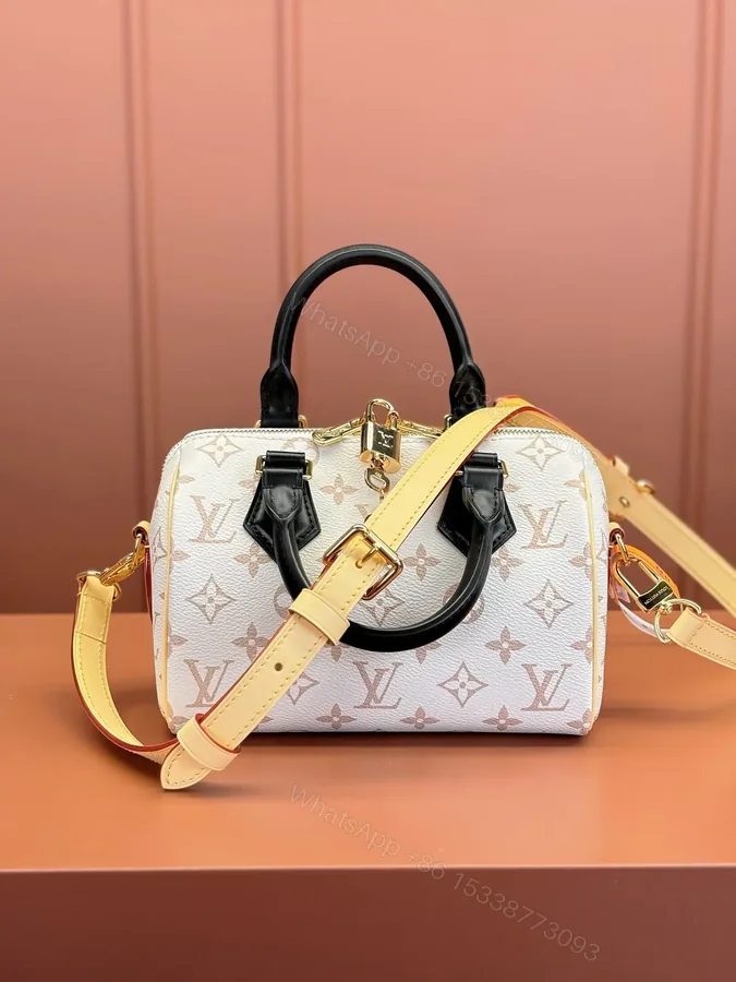 View 1 of Louis Vuitton Monogram Dune Speedy Bandoulière 20