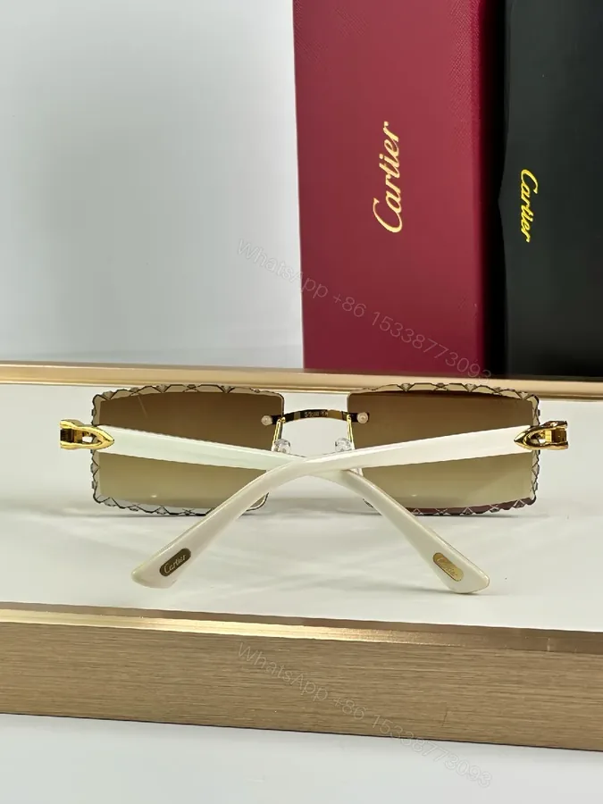 View 1 of Rimless Shield Sunglasses: Gold Accents, Luxury Minimalism