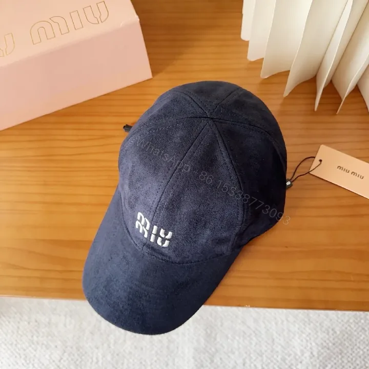 View 1 of Soft-Structured Navy Cap with Minimal Embroidery Details