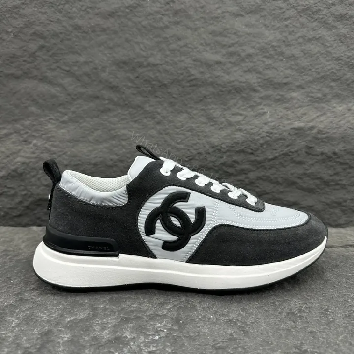 View 1 of Black and White Suede Nubuck Leather High-Top Sneaker with Signature Logo Embossment