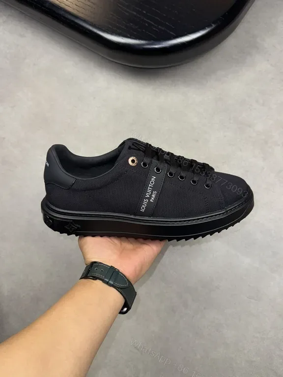 View 1 of Minimalist Black Knit Sneaker â€” Subtle LV Accent, All-Day Comfort