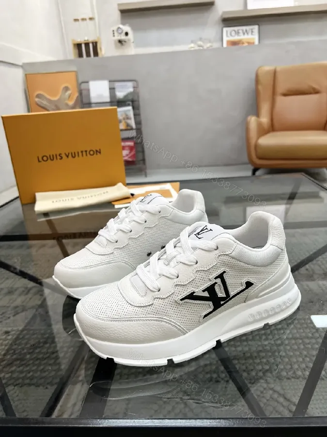 View 1 of White Leather Low-Top Luxury Sneakers with Subtle Logo Detail