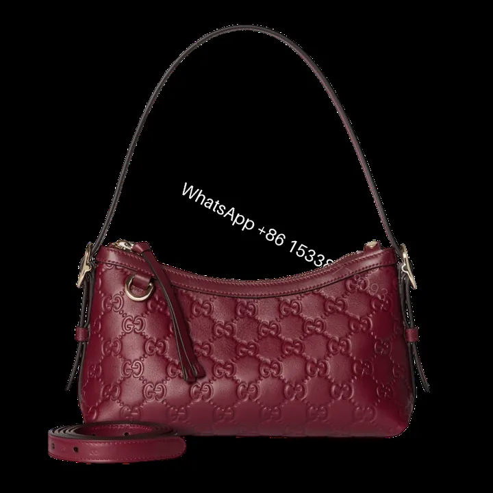 View 1 of Gucci GG Emblem Small Shoulder Bag – Rosso Ancora Red Leather