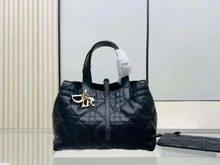 View 1 of Design MEDIUM TOUJOURS BAG Black Macrocannage Calfskin – Dubai Fashion LUX