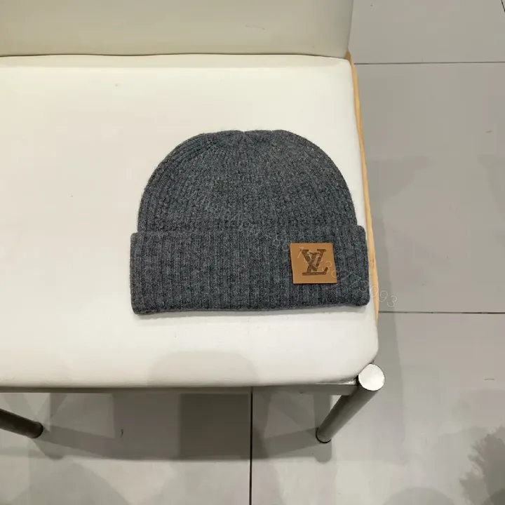 View 1 of Charcoal Knit Beanie with Leather Patch – Subtle Luxury Everyday