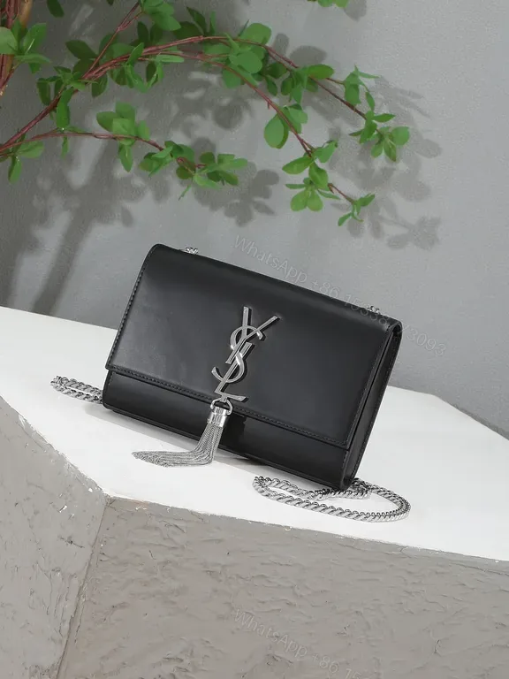 View 1 of Chic Black Leather Handbag â€” Metallic Logo Tassel Bag