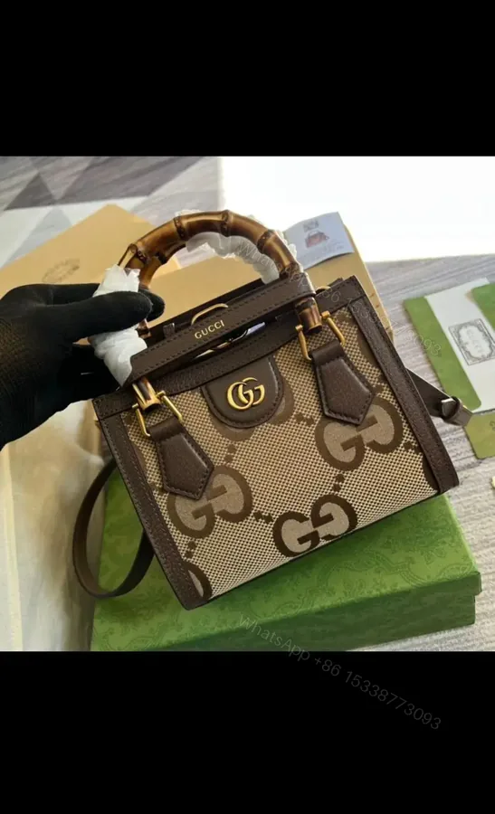 View 1 of GUCCI Diana mini tote with jumbo