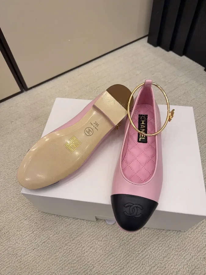 View 1 of Pink Quilted Leather Ballet Flats with Gold Hoop Accent - Cap Toe Detail