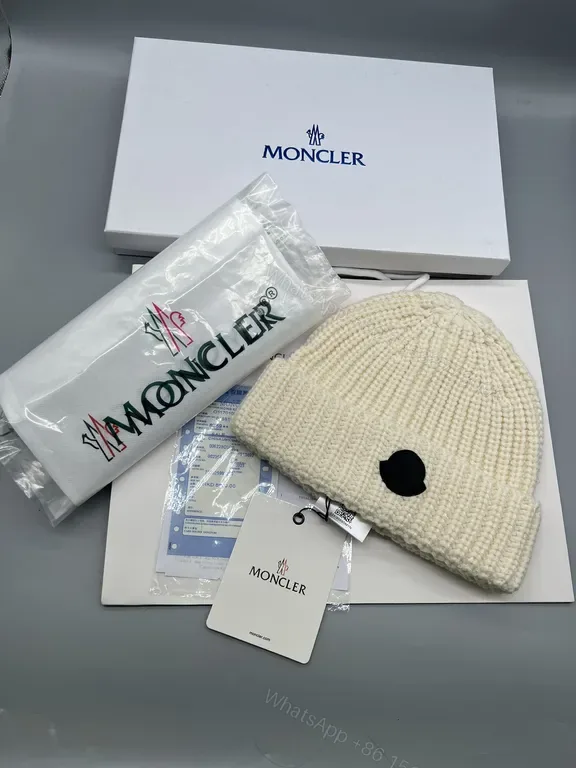 View 1 of Cream Knit Beanie with Signature Patch: Everyday Luxe Winter Accessory
