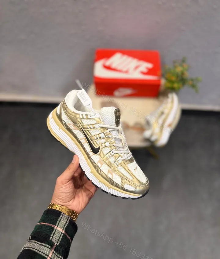 View 1 of Nike P-6000 Metallic Gold Trainers Men