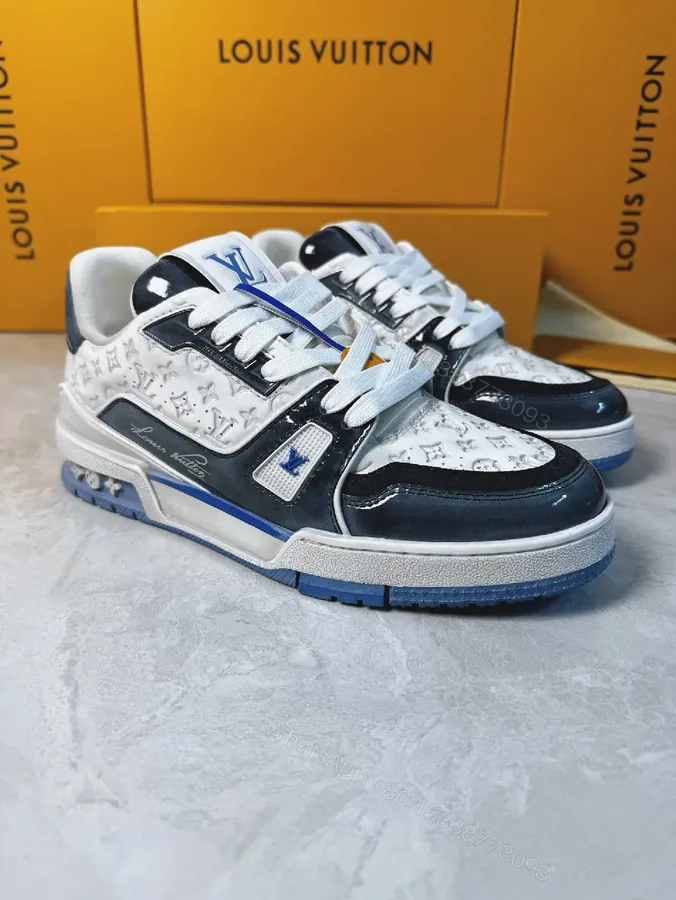 View 1 of Bold Navy Leather Textured Sneakers with LV Accent