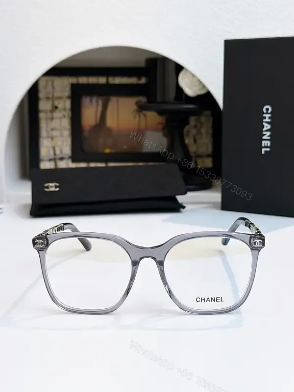 View 1 of Clear Translucent Frame Modern Oversized Sunglasses with CHANEL Accents
