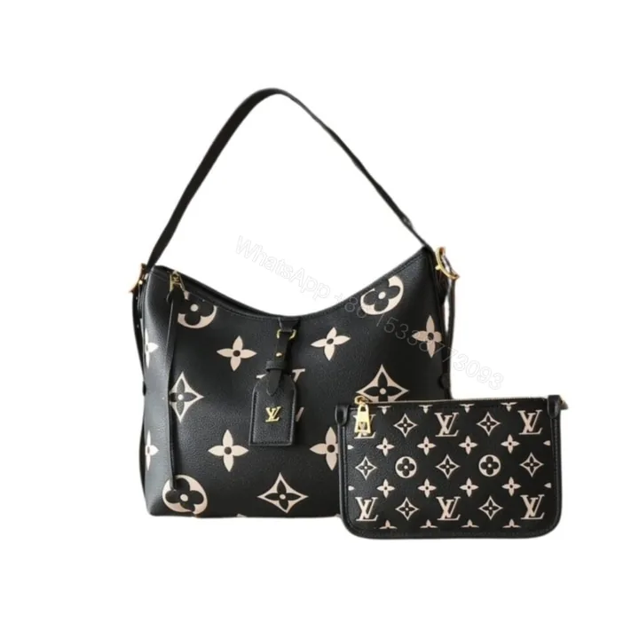 View 1 of Louis Vuitton Carryall PM Bicolor Monogram Empreinte Black 29Cm