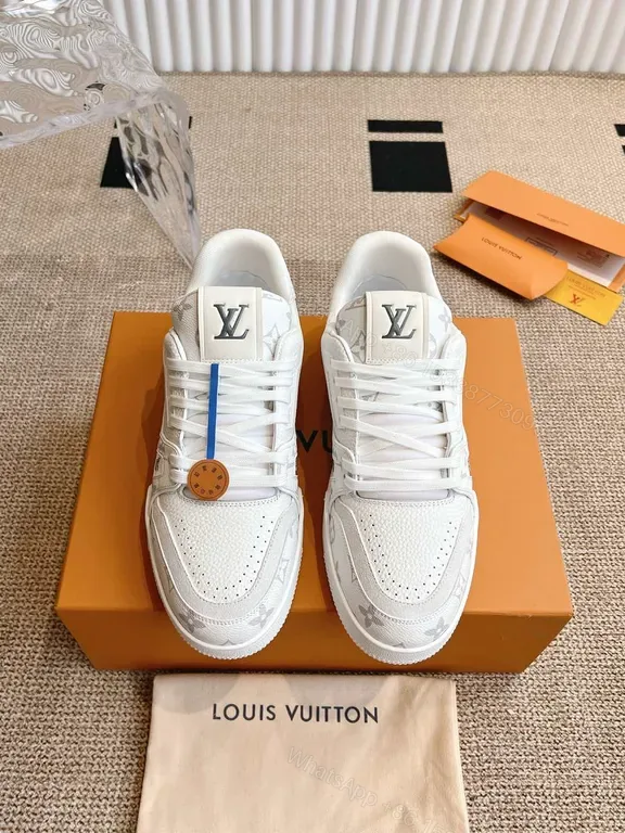 View 1 of Sleek Monogram-Accent White Sneakers: Luxury Comfort Sneakers