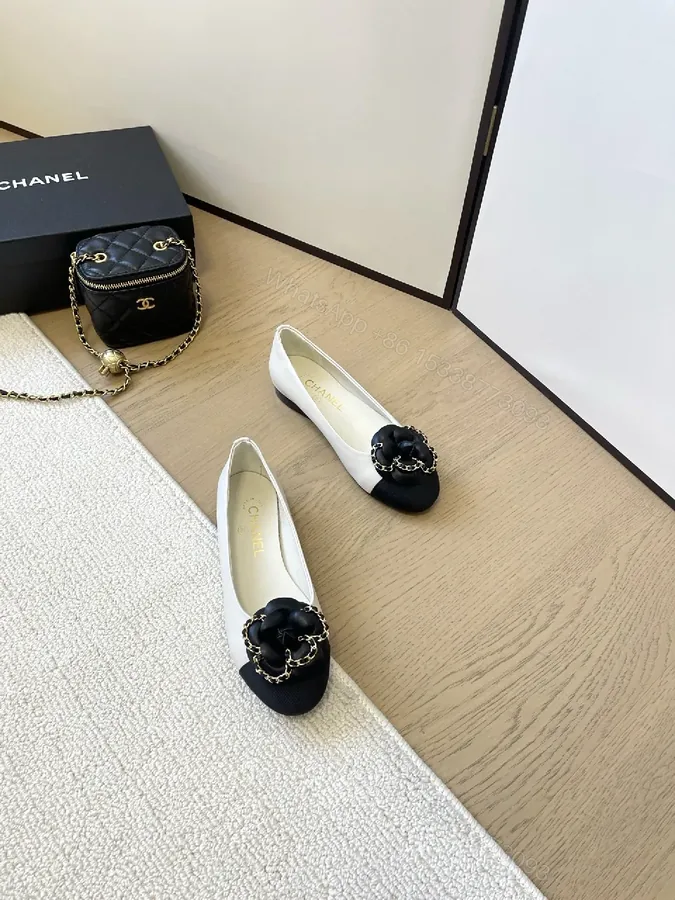 View 1 of Two-Tone Pointed-Toe Pumps with Chain Embellishment