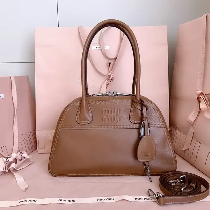 View 1 of Caramel Leather Satchel: Structured, Minimal Branding, All‐Day Essential