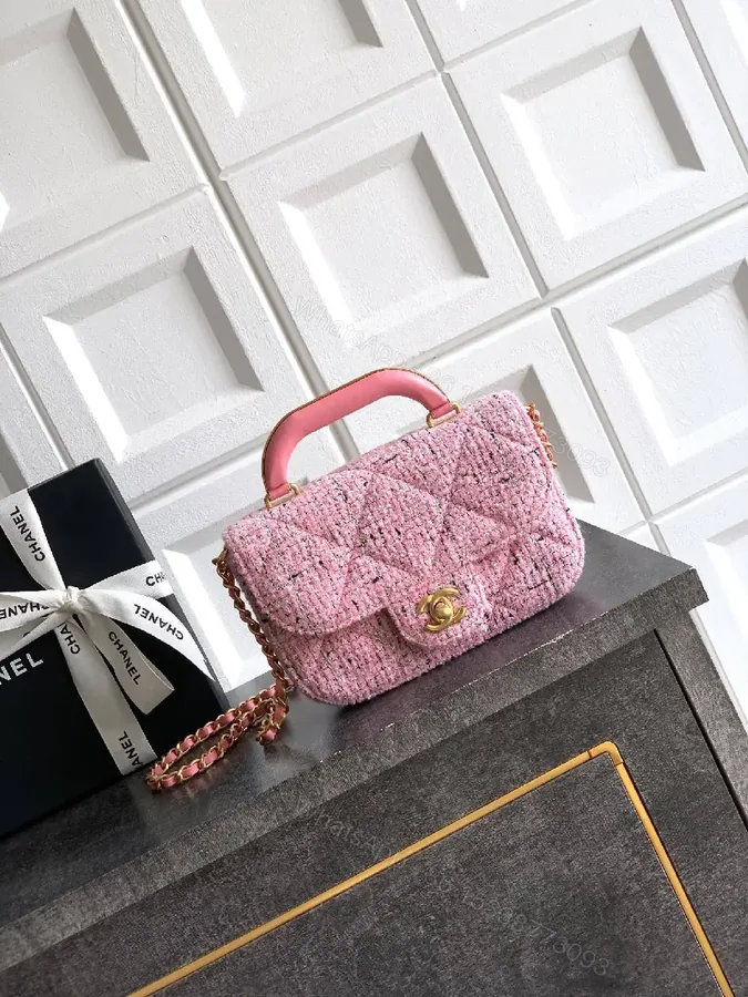 View 1 of Pink Bouclé Mini Bag with Twist Lock Crossbody