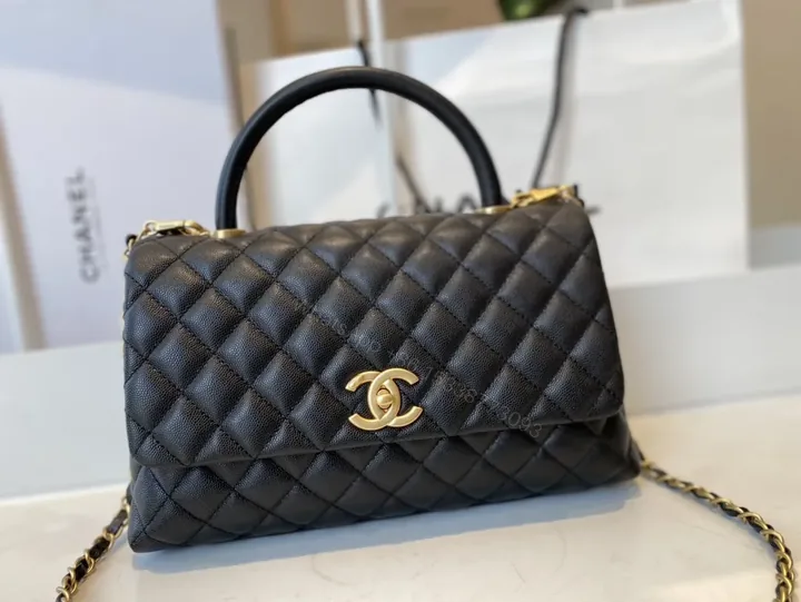 View 1 of Black Quilted Leather Bag with Gold Hardware â€“ Classic Chic Style, Top-Handle/Chain Straps, Compact Dressy Essential