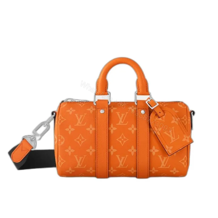View 1 of Louis Vuitton Keepall Bandoulière 25 Tangerine 25Cm M31044
