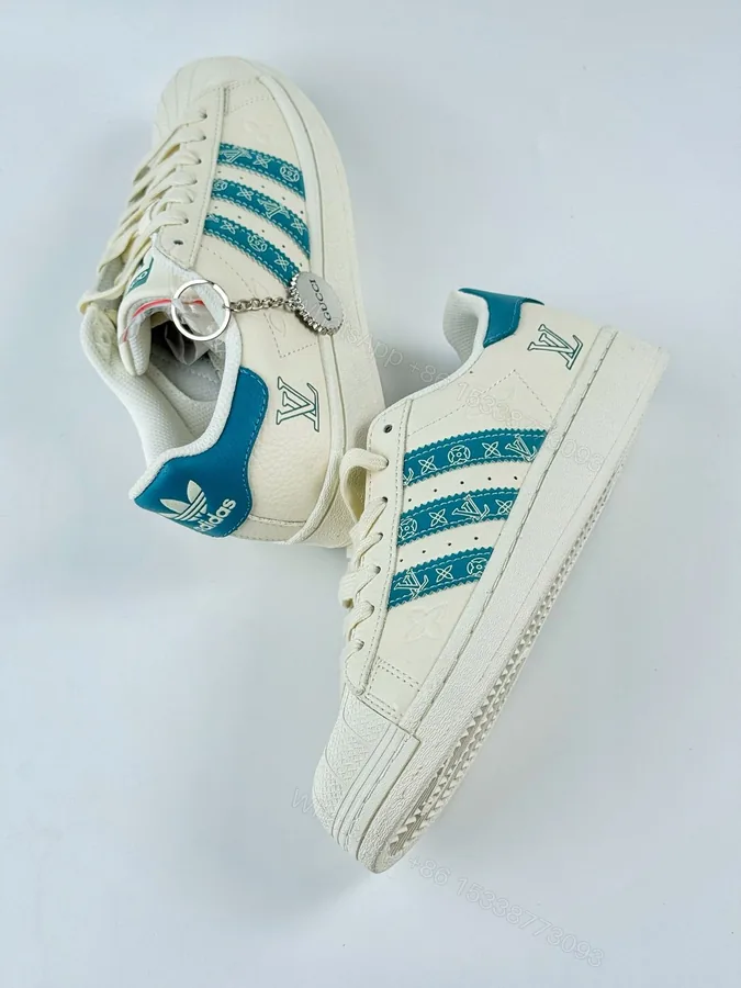 View 1 of Adidas Originals Superstar x Louis Vuitton Embossed First Copy Shoes | COD India