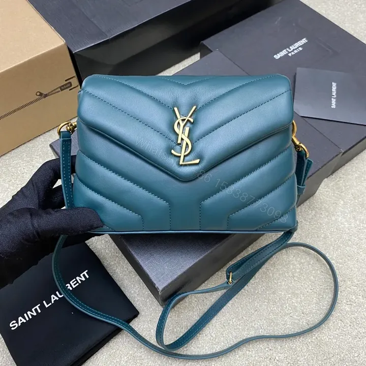 View 1 of Teal Quilted Flap Bag with Gold YSL Accent - Compact Luxury
