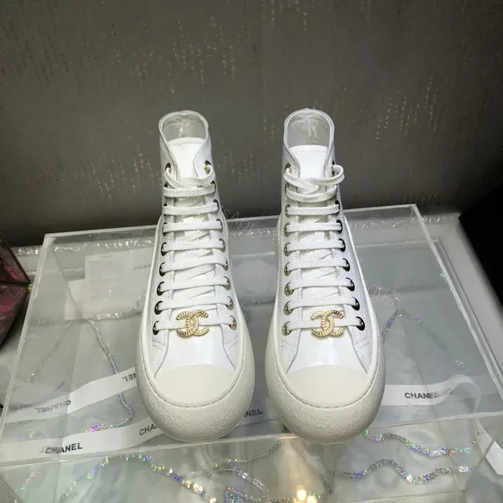 View 1 of Premium White High-Top Sneakers with Gold Emblem