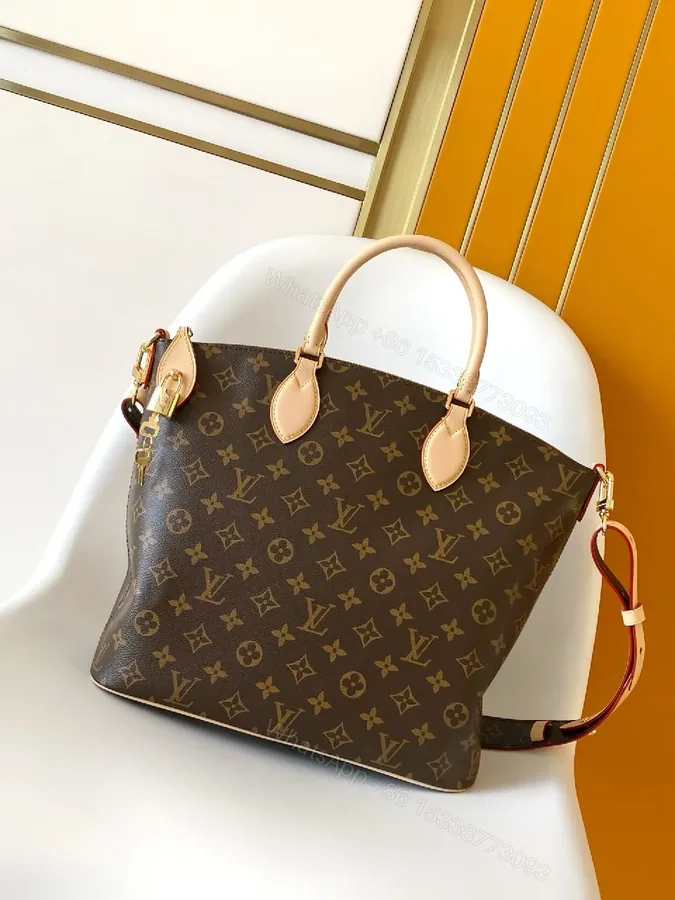 View 1 of Monogram Canvas Tote: Everyday Luxury, Structured Style