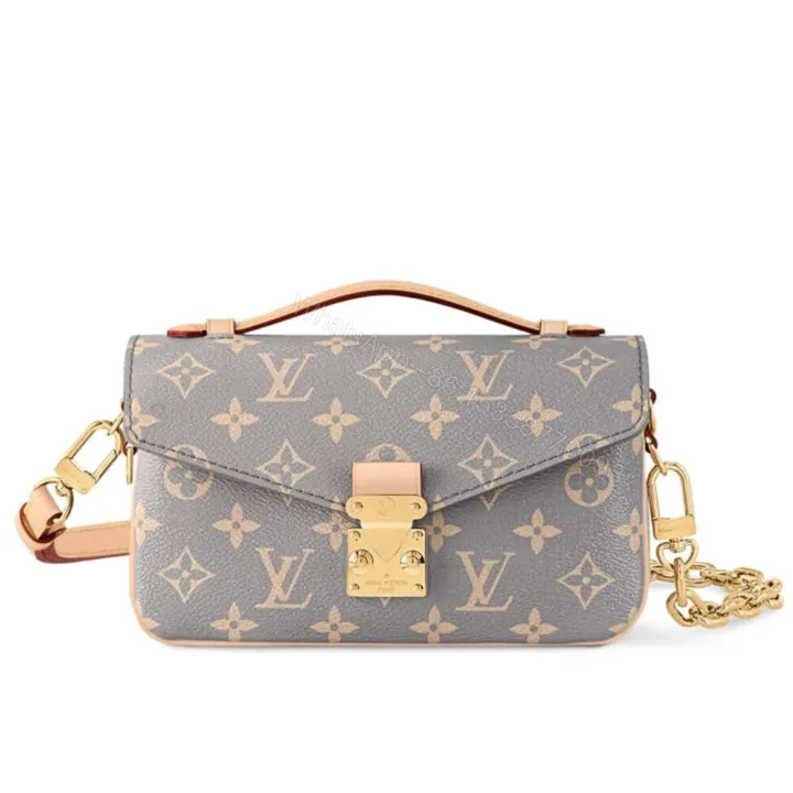 View 1 of Louis Vuitton Pochette Métis East West Coated Canvas Trianon 21Cm M12429