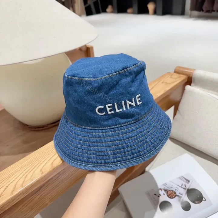 View 1 of Denim CELINE Lettering Bucket Hat â€“ Casual Luxury Sunglow Style