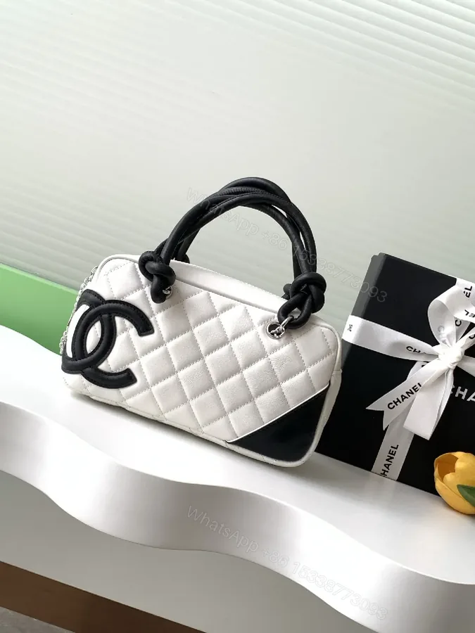 View 1 of Quilted Mini Bag with Signature Hardware - Dual-Tone Chic