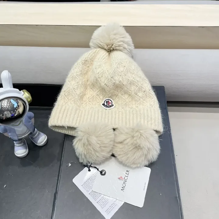 View 1 of Ivory Knit Beanie with Plush Earmuffs & Pom – Cozy Luxe Style