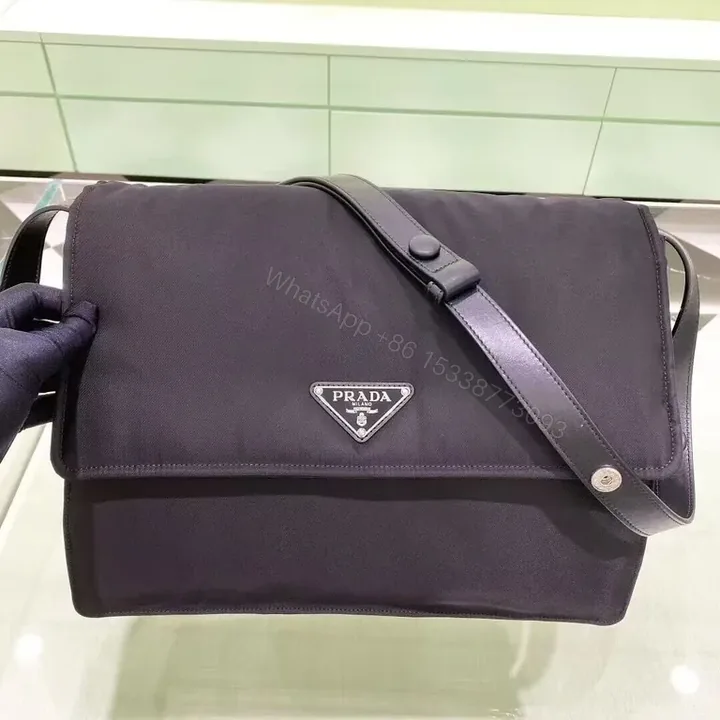 View 1 of Black Nylon Crossbody Bag with Purple Strap - Compact Luxury City-Ready Bag