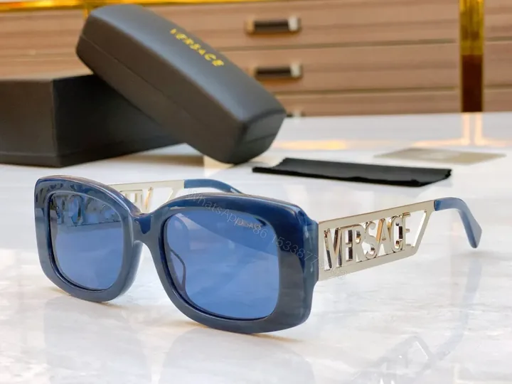 View 1 of Blue Acetate Sculpted Frame Sunglasses - Premium Logo, UV400 Lenses