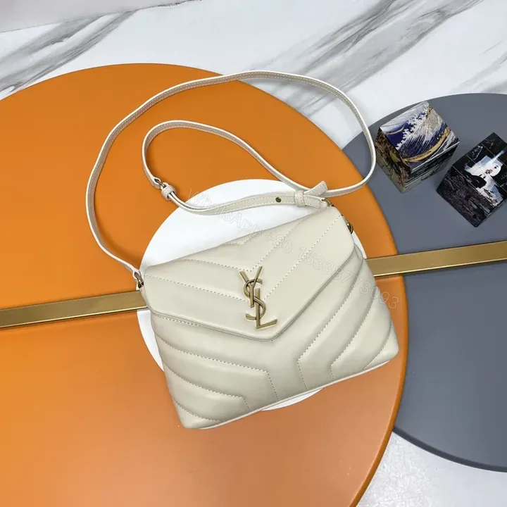 View 1 of Beige Quilted Lambskin Shoulder Bag with Gold YSL Hardware