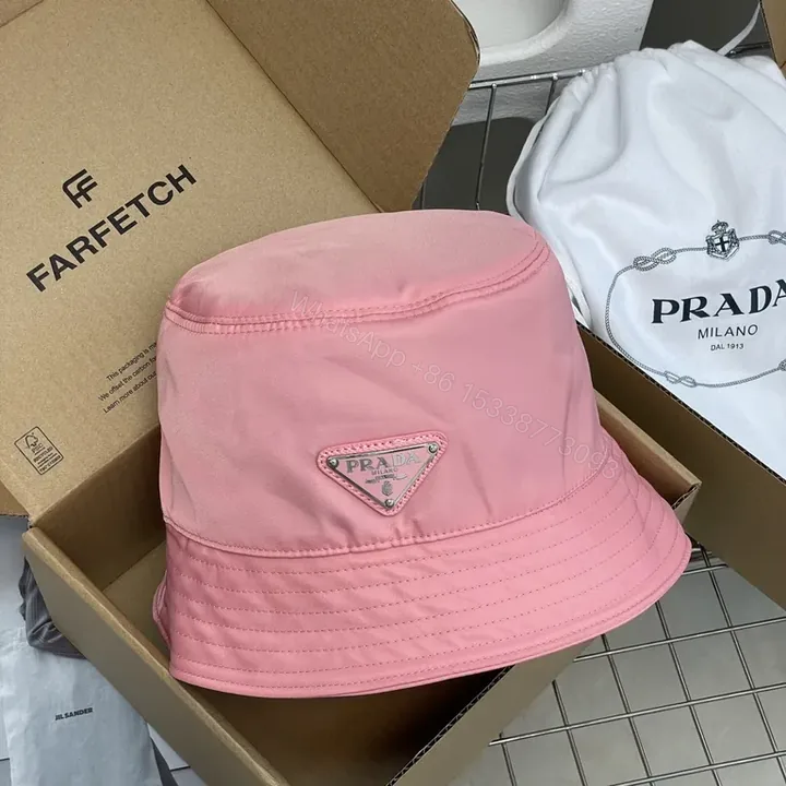 View 1 of Vivid Pink Prada Bucket Hat: Lightweight Luxury, Sun Shield