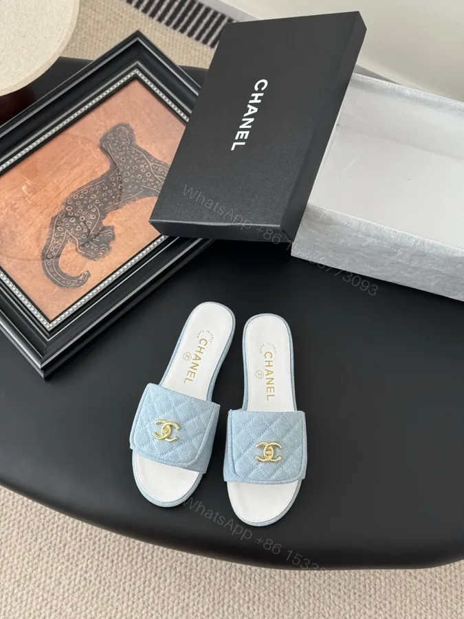 View 1 of Chanel Women Light Blue Quilted Fabric Slides