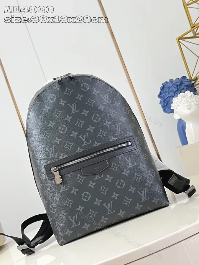 View 1 of Compact Monogram Canvas Backpack: Subtle Luxury, Everyday Utility