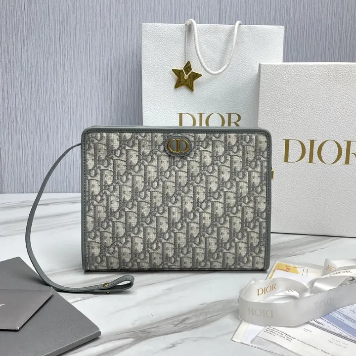 View 1 of Structured Monogram Wallet — Signature Pattern, Gold Hardware, Zippered Clutch