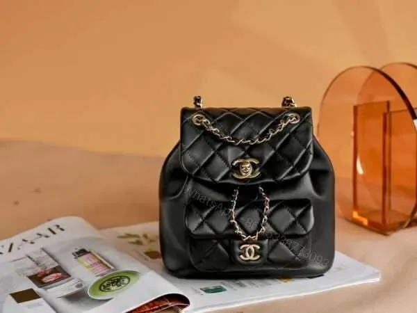 View 1 of Chanel Mini Smooth Leather Backpack 11 With Gold Lock Women’s Black 18x19x12cm