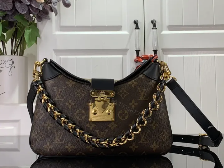 View 1 of Iconic Monogram Canvas Bag: Modern Shine, Gold Hardware, Everyday Luxury
