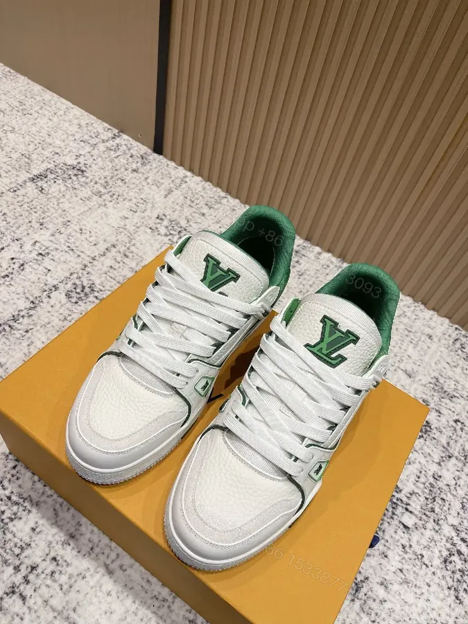 View 1 of White Leather Sneakers with Green Accents: Luxury Everyday Streetwear