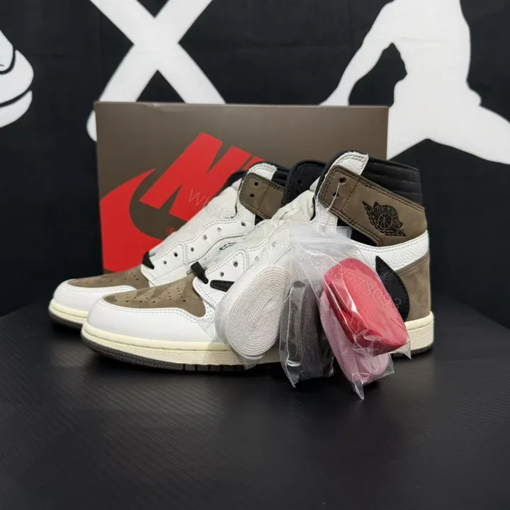 View 1 of Travis Scott × Air Jordan 1 High ‘Reverse Mocha’