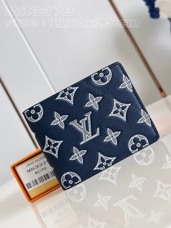 View 1 of Navy LV-Patterned Compact Wallet: Everyday Luxury
