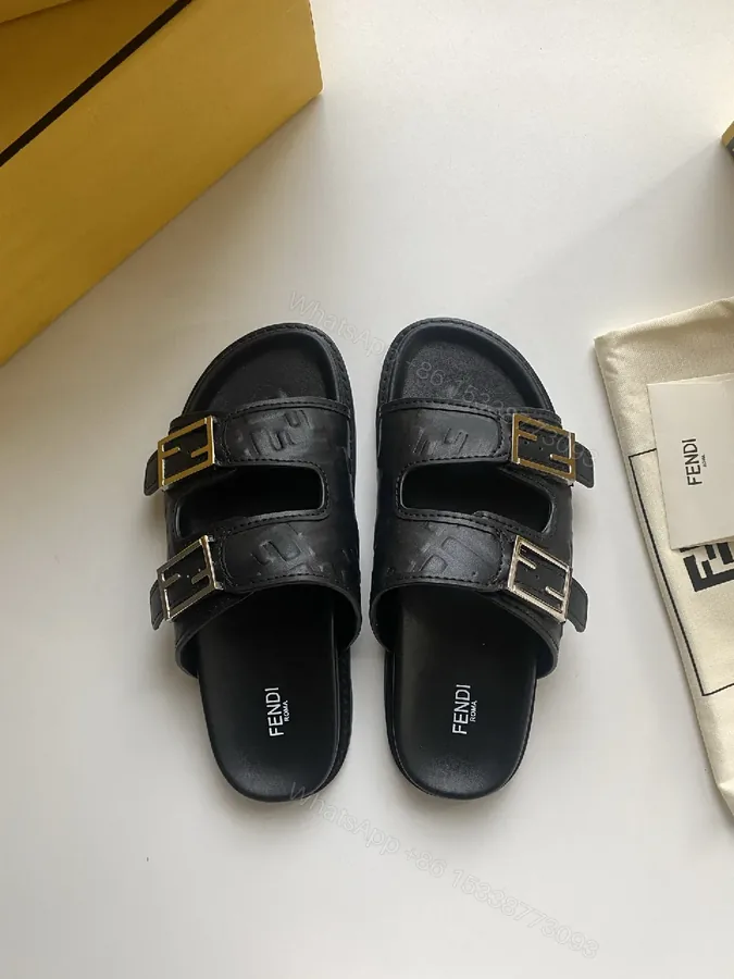 View 1 of Bold Leather Slides with Signature Detailing – Everyday Opulence