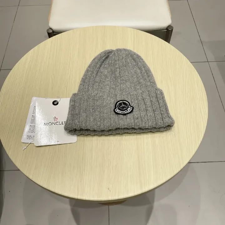 View 1 of Grey Knit Beanie - Premium Ribbed Style, Moncler Badge Feature