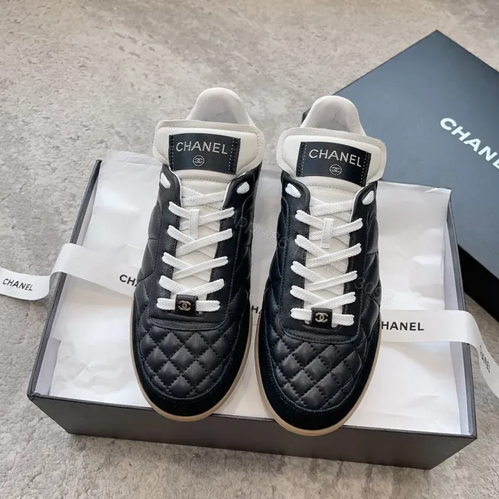 View 1 of Textured Quilted Chanel-Accented High-Tops: Luxury Sneakers