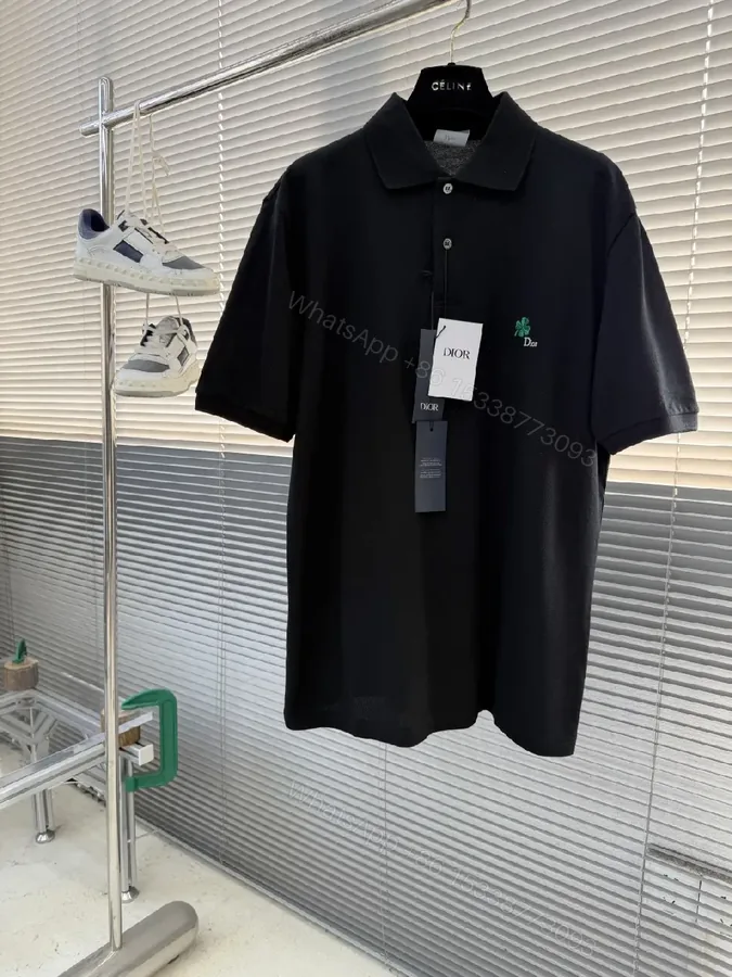 View 1 of Black Polo Tee with Green Clover – Subtle Luxe Everyday Polo