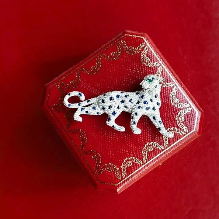 View 1 of Panthere de cartier broche diamants et saphirs complets