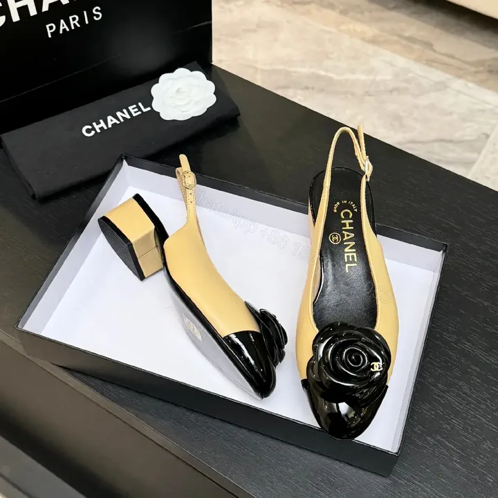 View 1 of Two-Tone Slingback Pumps with Rose Detail - Sophisticated Comfort