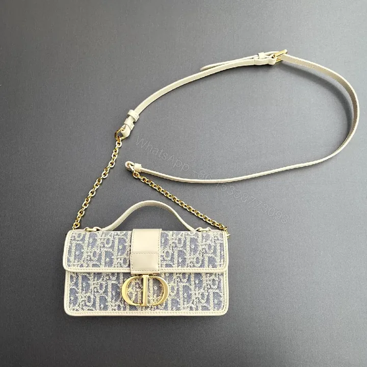 View 1 of Chic Monogram Mini Bag: Luxe Chain, Structured Texture